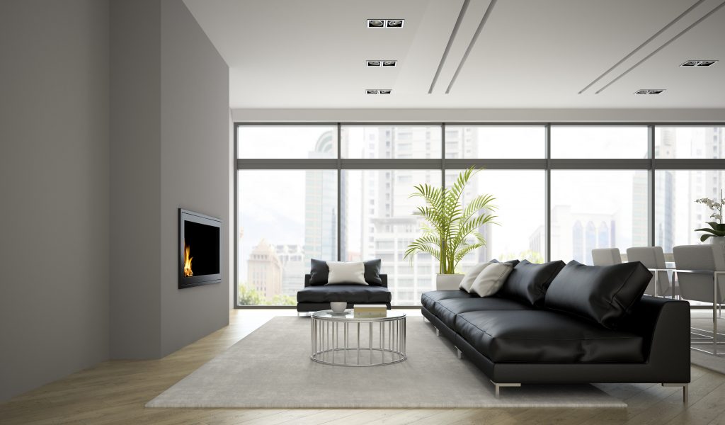 Interior of modern  loft with fireplace and black sofa 3D rendering